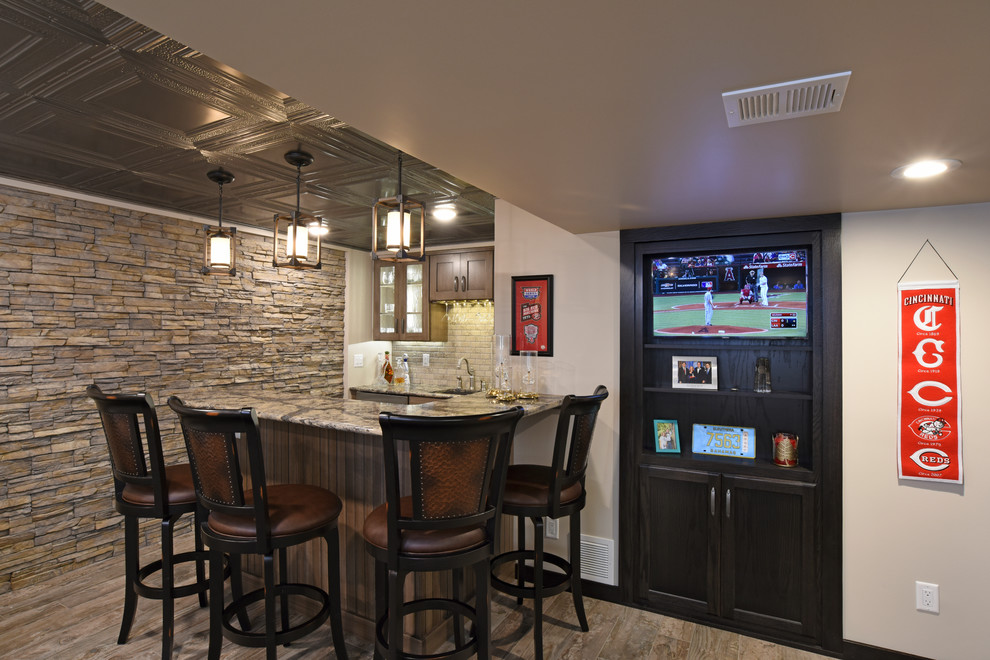 Example of a mid-sized classic underground porcelain tile and gray floor basement design in Other with beige walls