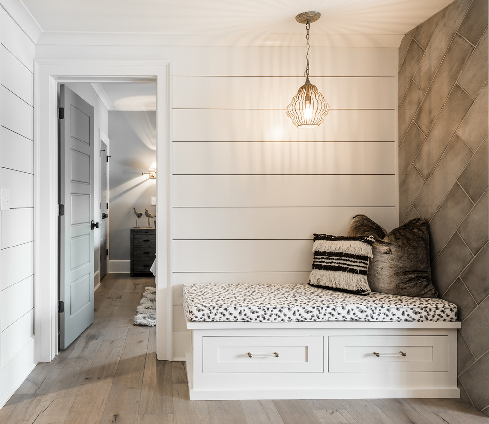 Basement - mid-sized modern walk-out light wood floor basement idea in Atlanta with white walls