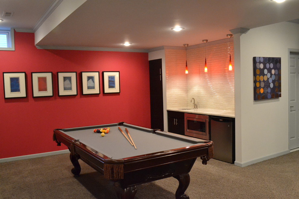 Example of a mid-sized transitional underground carpeted and beige floor basement design in Detroit with red walls and no fireplace