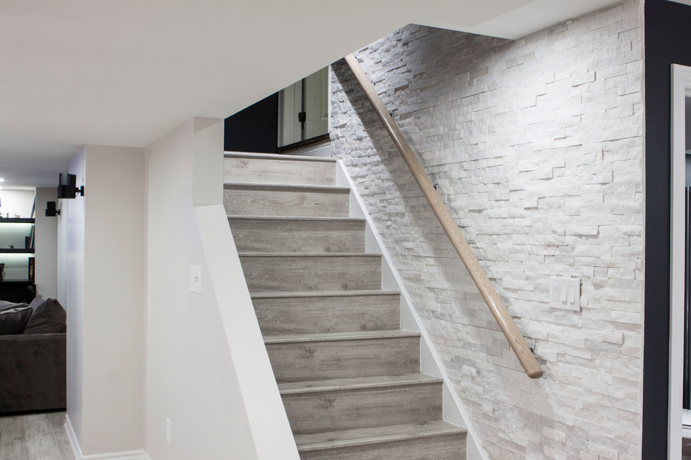 Staircase - large modern staircase idea in Toronto