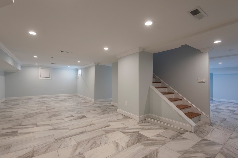 Basement - large modern walk-out ceramic tile basement idea in Philadelphia with blue walls and no fireplace