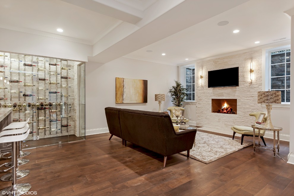 Example of a transitional dark wood floor basement design in Chicago with gray walls, a standard fireplace and a tile fireplace