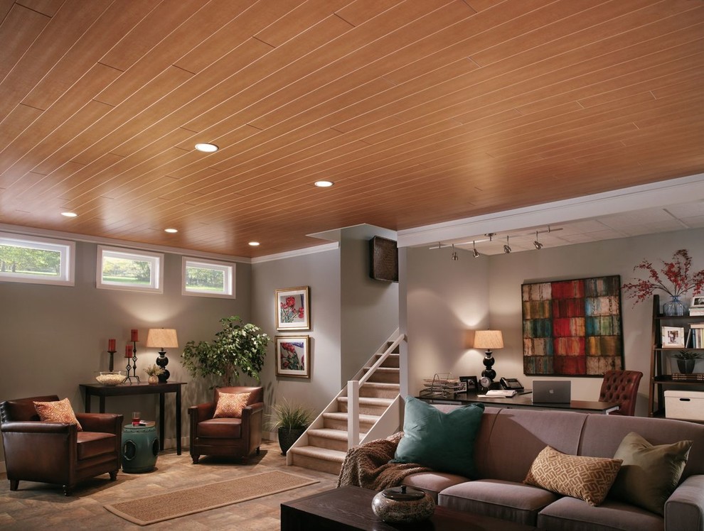 Basement - mid-sized traditional look-out carpeted and beige floor basement idea in Other with gray walls