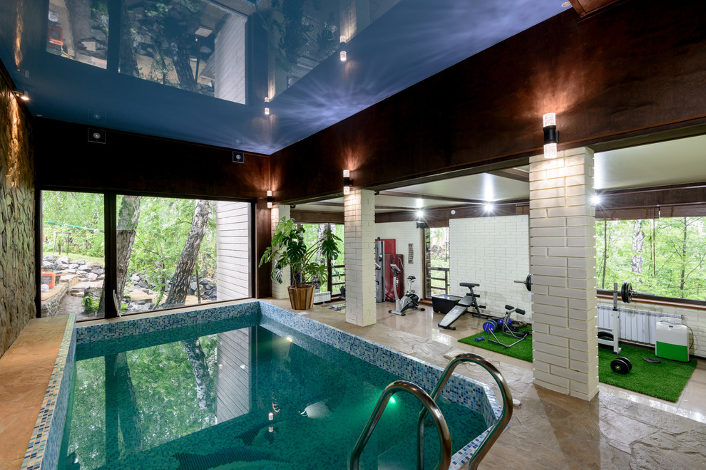 Foto de piscina contemporánea de tamaño medio rectangular y interior