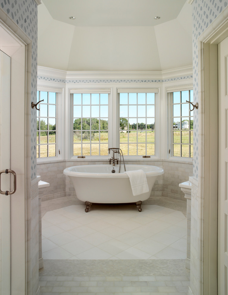 Large traditional ensuite bathroom in Providence with a claw-foot bath and ceramic flooring.