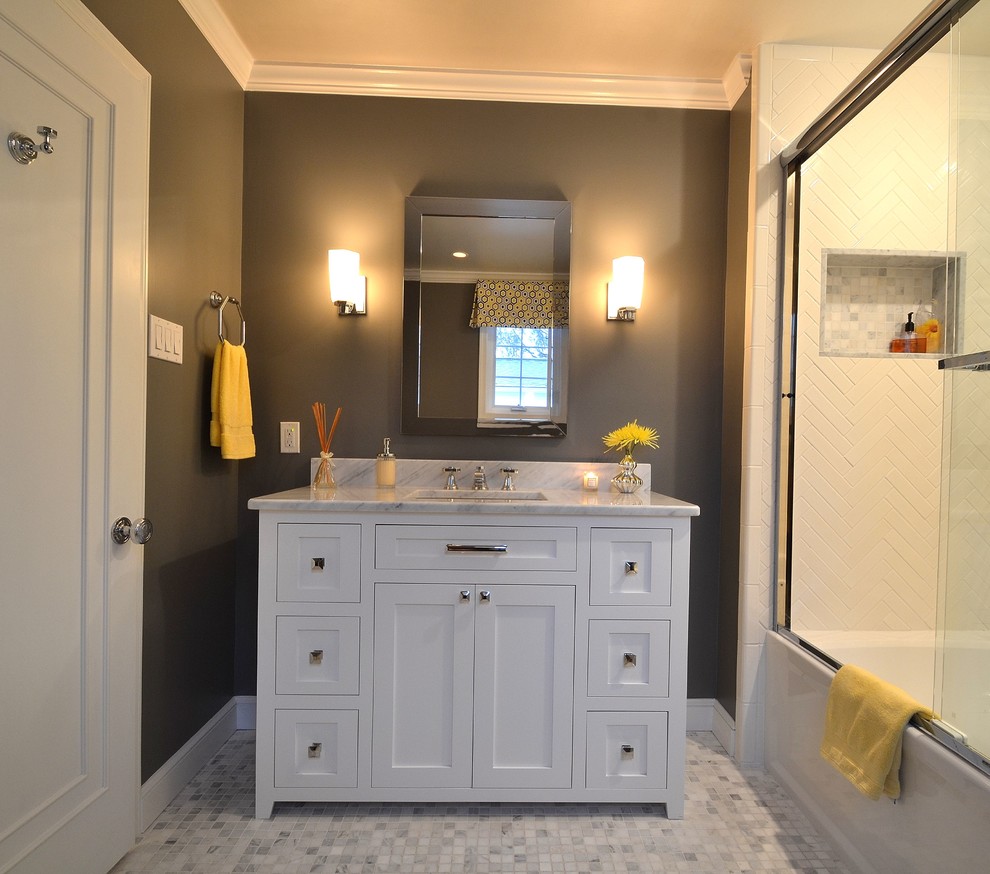 Transitional white tile and ceramic tile bathroom photo in Philadelphia with shaker cabinets, white cabinets and marble countertops
