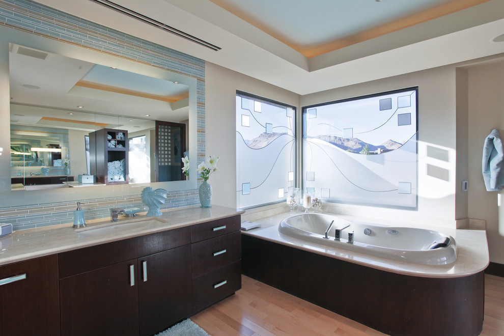Contemporary bathroom in Las Vegas with a submerged sink.