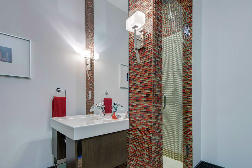 Example of a trendy multicolored tile alcove shower design in St Louis with an integrated sink