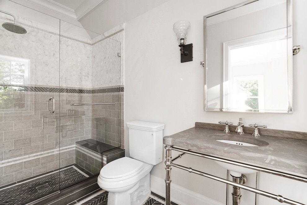 Example of a mid-sized transitional white tile and stone tile limestone floor doorless shower design in New York with open cabinets, a two-piece toilet, beige walls, a drop-in sink and marble countertops