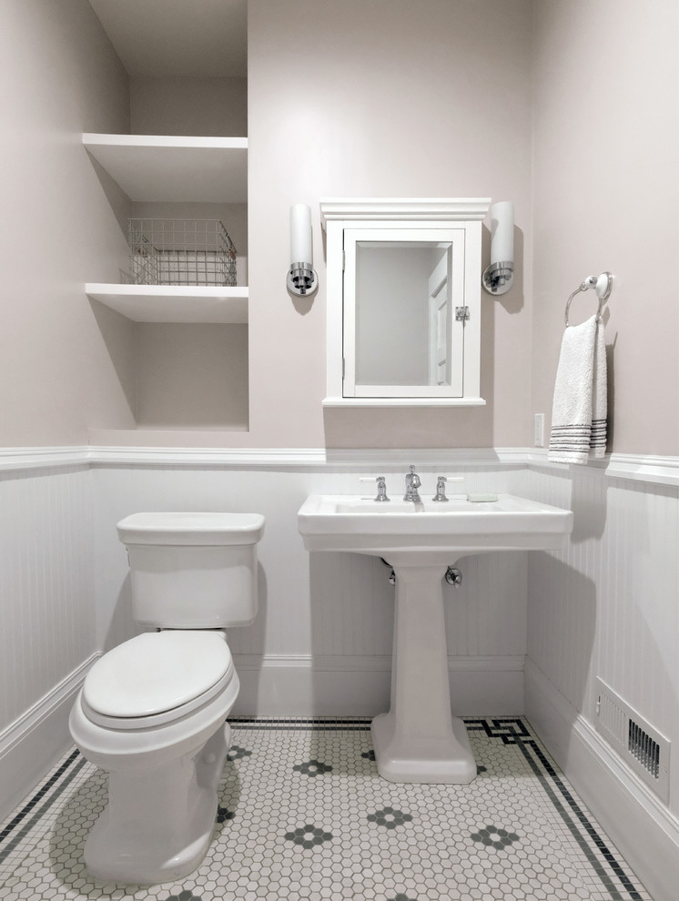 Photo of a medium sized traditional bathroom in San Francisco with an alcove shower, a two-piece toilet, beige walls, ceramic flooring, a pedestal sink, white floors and a shower curtain.