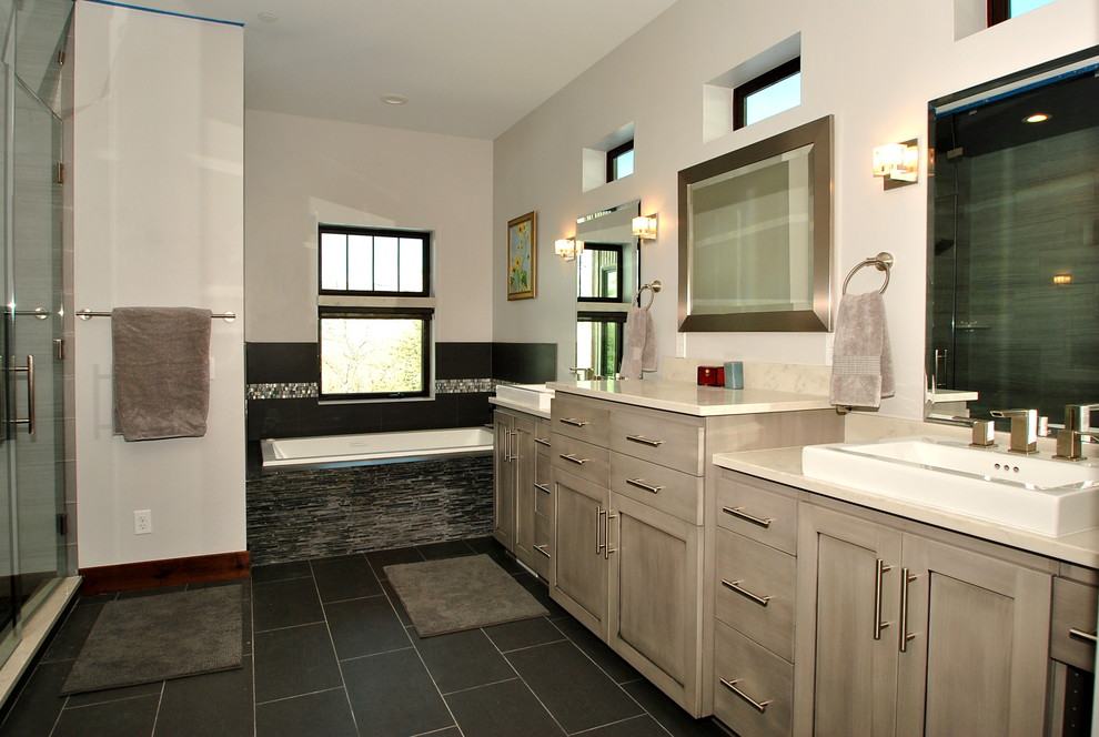 Bathroom - large contemporary master white tile slate floor and black floor bathroom idea in Salt Lake City with shaker cabinets, gray cabinets, quartzite countertops, white walls, a drop-in sink and a hinged shower door