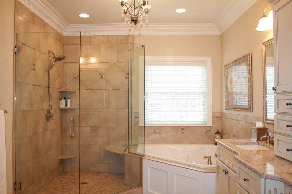Design ideas for a medium sized classic bathroom in Chicago with shaker cabinets, white cabinets, a corner bath, a corner shower, beige tiles, ceramic tiles, beige walls, ceramic flooring, a submerged sink, granite worktops, beige floors and a hinged door.