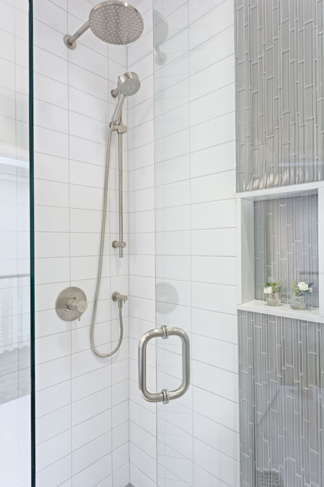 This is an example of a small traditional shower room bathroom in Toronto with a submerged sink, recessed-panel cabinets, grey cabinets, marble worktops, an alcove shower, a two-piece toilet, white tiles, metro tiles, grey walls and porcelain flooring.