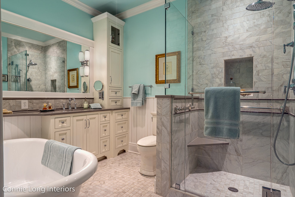 Inspiration for a small craftsman master white tile and porcelain tile porcelain tile bathroom remodel in Nashville with shaker cabinets, white cabinets, a two-piece toilet, blue walls, an undermount sink and quartz countertops