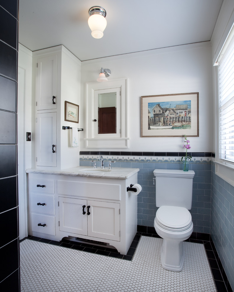 Example of an eclectic 3/4 blue tile and subway tile mosaic tile floor bathroom design in San Diego with shaker cabinets, white cabinets, a two-piece toilet, white walls, an undermount sink and marble countertops