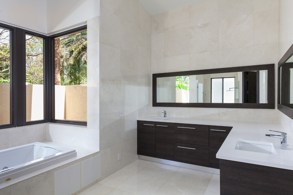 Mid-sized trendy master white tile and stone tile marble floor bathroom photo in Miami with flat-panel cabinets, dark wood cabinets, white walls, an undermount sink and quartzite countertops