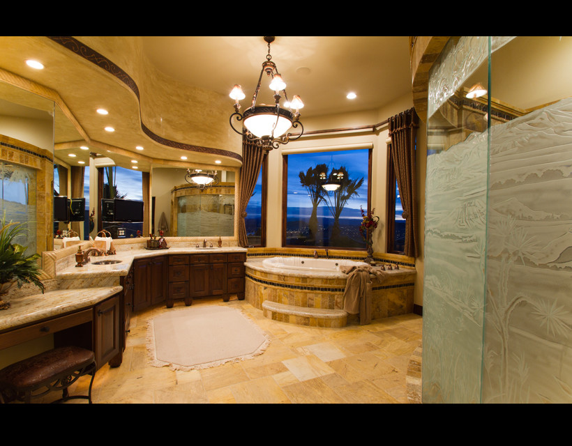 Design ideas for an expansive traditional ensuite bathroom in Salt Lake City with shaker cabinets, dark wood cabinets, a built-in bath, an alcove shower, beige tiles, beige walls, travertine flooring, a submerged sink and granite worktops.