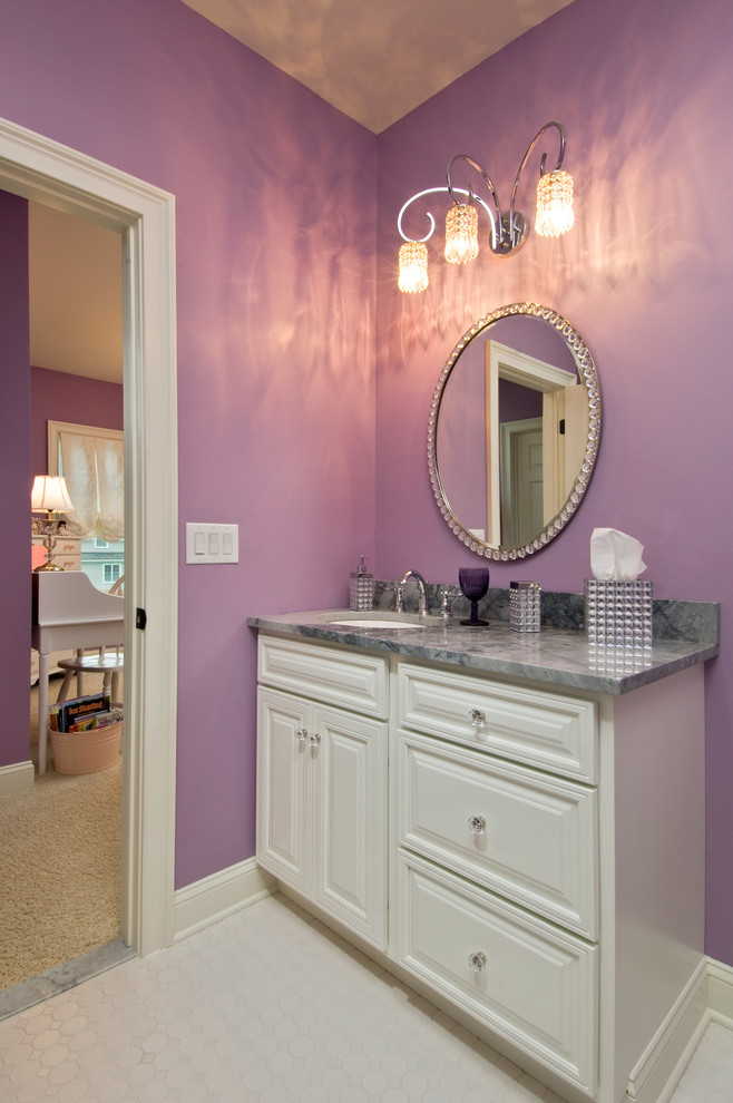Example of a kids' bathroom design in Boston with raised-panel cabinets and granite countertops