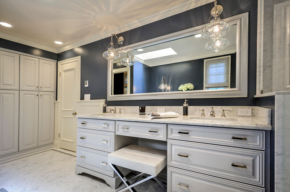 Inspiration for a traditional bathroom in San Francisco with raised-panel cabinets.