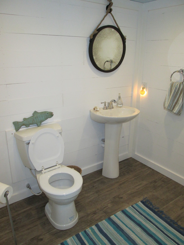 Bathroom - mid-sized coastal 3/4 dark wood floor bathroom idea in Indianapolis with a pedestal sink and white walls