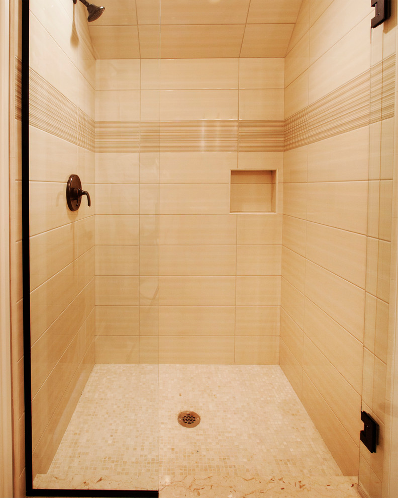 Example of a mid-sized minimalist master beige tile alcove shower design in Other