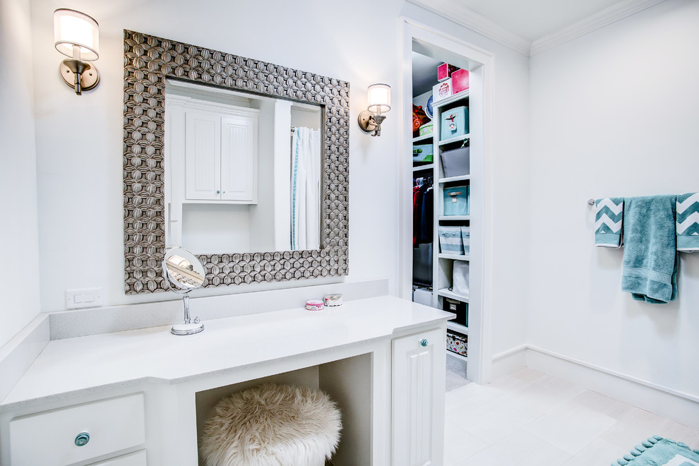 Example of a mid-sized transitional kids' brown tile and subway tile porcelain tile bathroom design in Austin with raised-panel cabinets, white cabinets and white walls