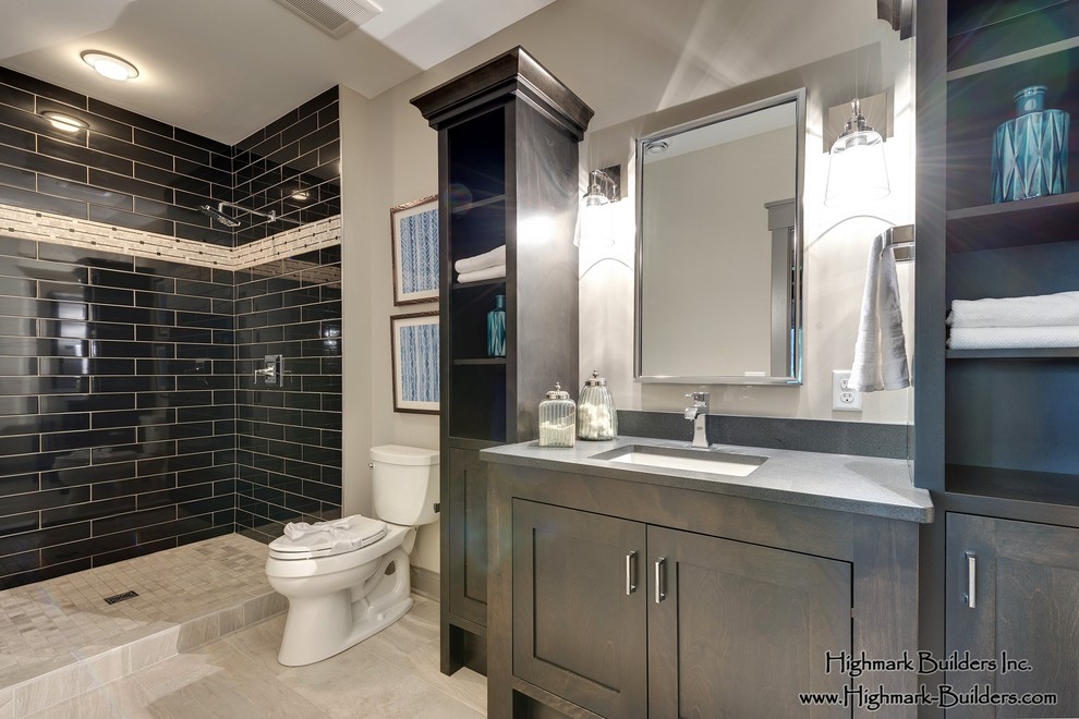 Inspiration for a traditional shower room bathroom in Minneapolis with a built-in sink, freestanding cabinets, dark wood cabinets, granite worktops, a walk-in shower, a two-piece toilet, beige tiles, porcelain tiles, beige walls and porcelain flooring.