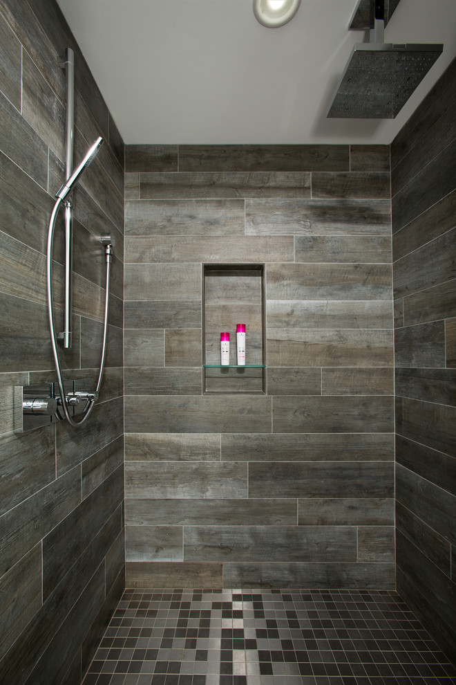 Alcove shower - mid-sized contemporary master brown tile and glass tile mosaic tile floor alcove shower idea in DC Metro with flat-panel cabinets, brown cabinets, an undermount sink, a two-piece toilet and marble countertops