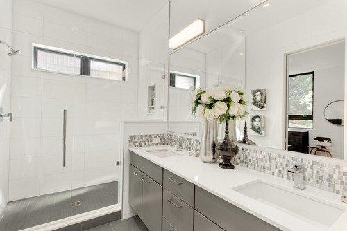 Bathroom cabinets color in white and light gray tones reflecting the Metal element for Feng Shui clarity and purity