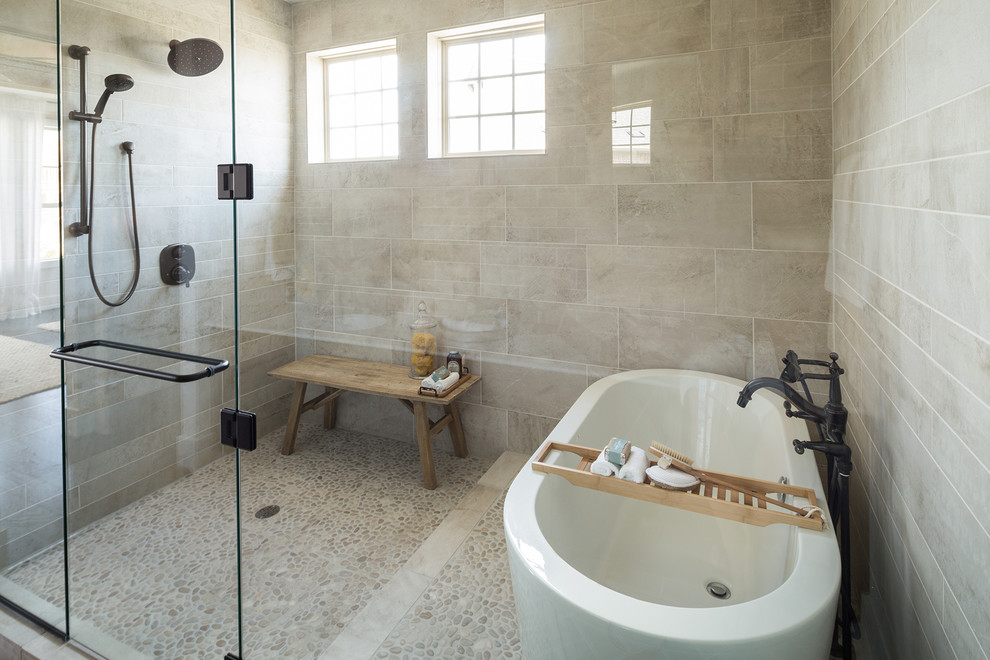 На фото: главная ванная комната в средиземноморском стиле с темными деревянными фасадами, отдельно стоящей ванной, душевой комнатой, белой плиткой, белыми стенами, накладной раковиной, коричневым полом и душем с распашными дверями с