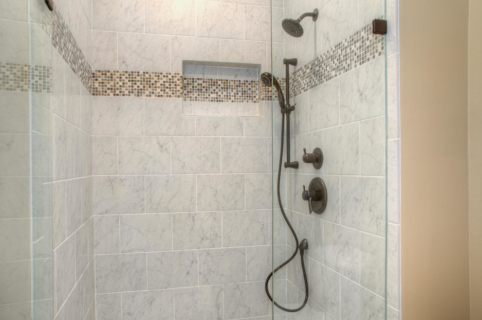 Alcove shower - large transitional master beige tile and ceramic tile medium tone wood floor alcove shower idea in Other with shaker cabinets, white cabinets, an undermount sink, granite countertops and yellow walls