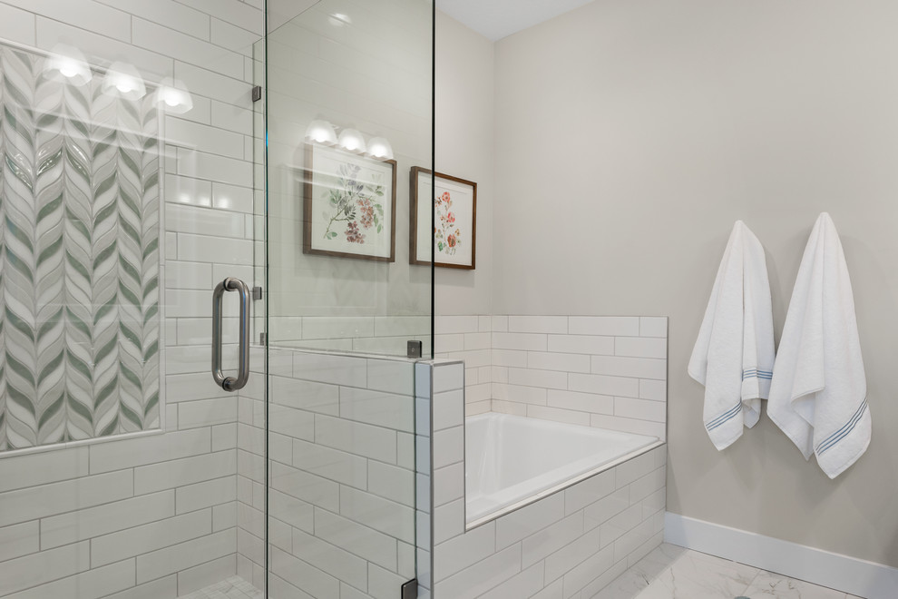 Example of a mid-sized trendy master white tile and subway tile marble floor and white floor bathroom design in Salt Lake City with recessed-panel cabinets, white cabinets, a two-piece toilet, gray walls, an undermount sink, quartz countertops, a hinged shower door and white countertops