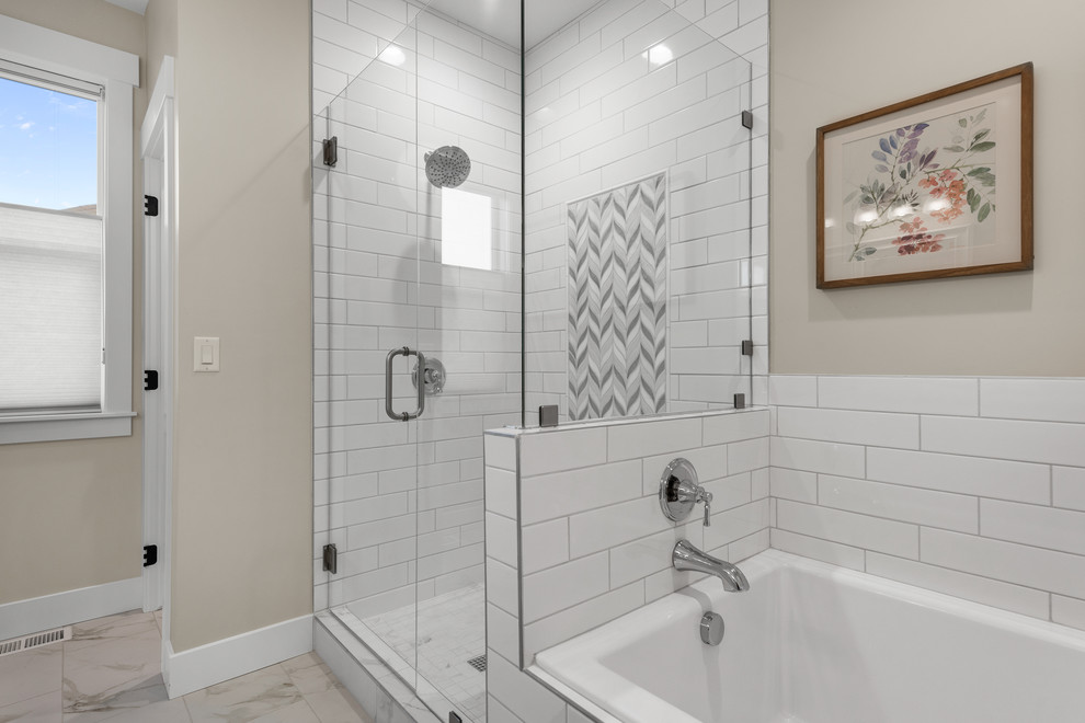Mid-sized trendy master white tile and subway tile marble floor and white floor bathroom photo in Salt Lake City with recessed-panel cabinets, white cabinets, a two-piece toilet, gray walls, an undermount sink, quartz countertops, a hinged shower door and white countertops