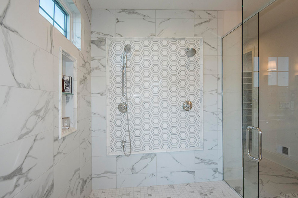 Large transitional master gray tile and marble tile marble floor and gray floor bathroom photo in Milwaukee with furniture-like cabinets, gray cabinets, a two-piece toilet, white walls, an undermount sink, quartz countertops, a hinged shower door and white countertops
