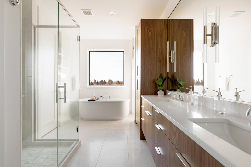 Bathroom - contemporary master marble floor, white floor and double-sink bathroom idea in Minneapolis with brown cabinets, an undermount sink, marble countertops, a hinged shower door, white countertops and a floating vanity