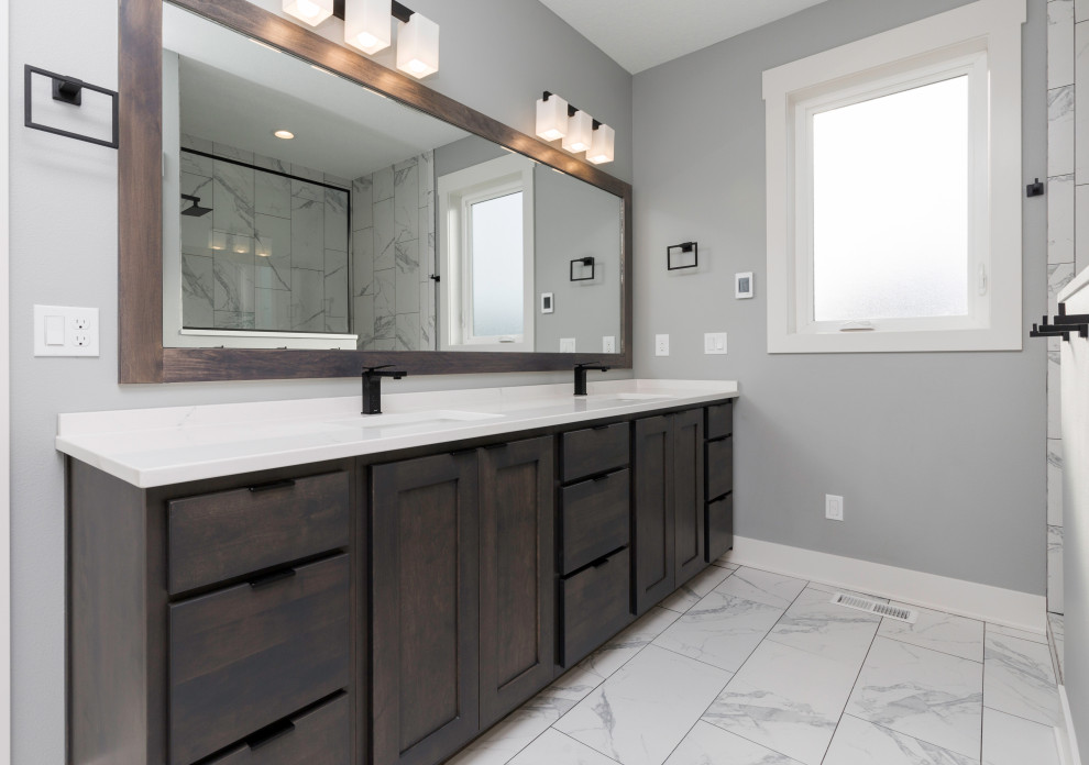 Bathroom - mid-sized modern master marble floor and white floor bathroom idea in Other with shaker cabinets, dark wood cabinets, gray walls, an undermount sink, quartzite countertops and white countertops