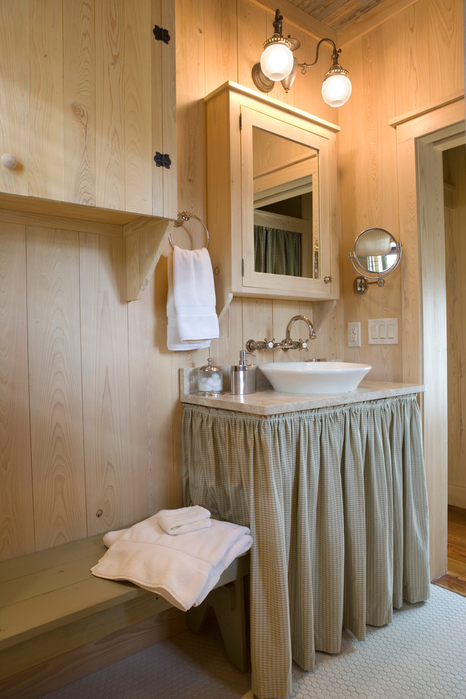 Example of a country bathroom design in Atlanta with a vessel sink