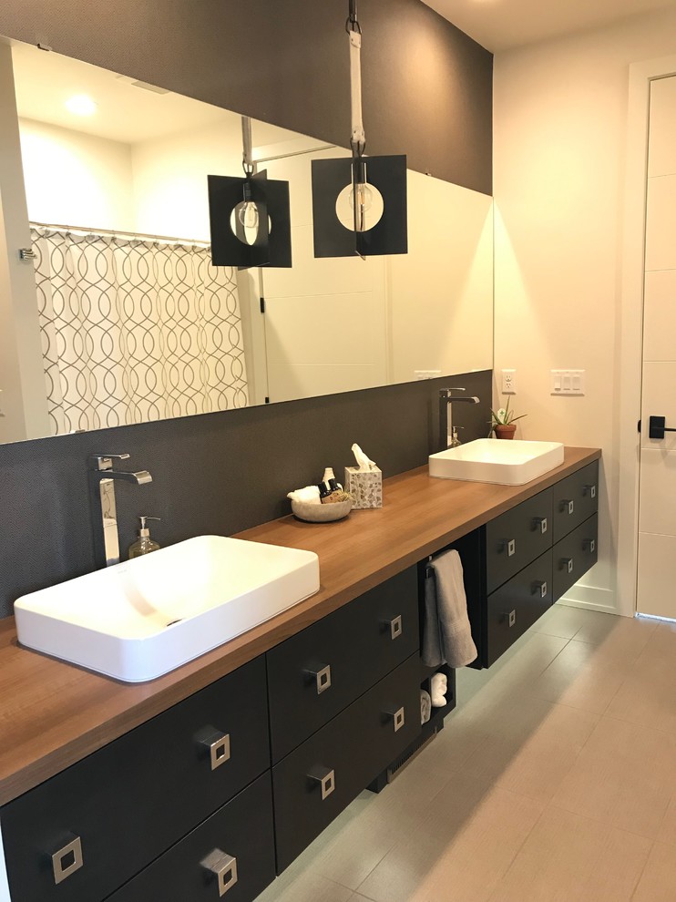 Photo of a medium sized modern bathroom in Other with flat-panel cabinets, black cabinets, white tiles, ceramic flooring, laminate worktops, grey floors and brown worktops.