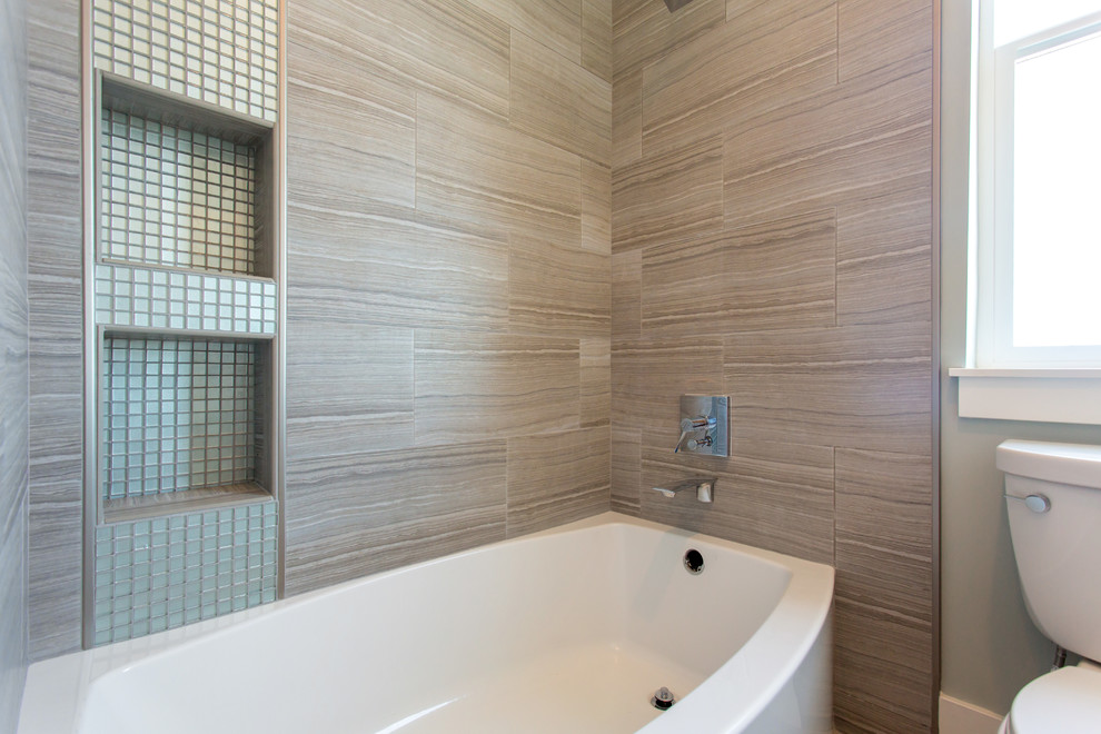 Bathroom - mid-sized transitional kids' gray tile and porcelain tile porcelain tile bathroom idea in Phoenix with a vessel sink, shaker cabinets, dark wood cabinets, granite countertops, a two-piece toilet and green walls