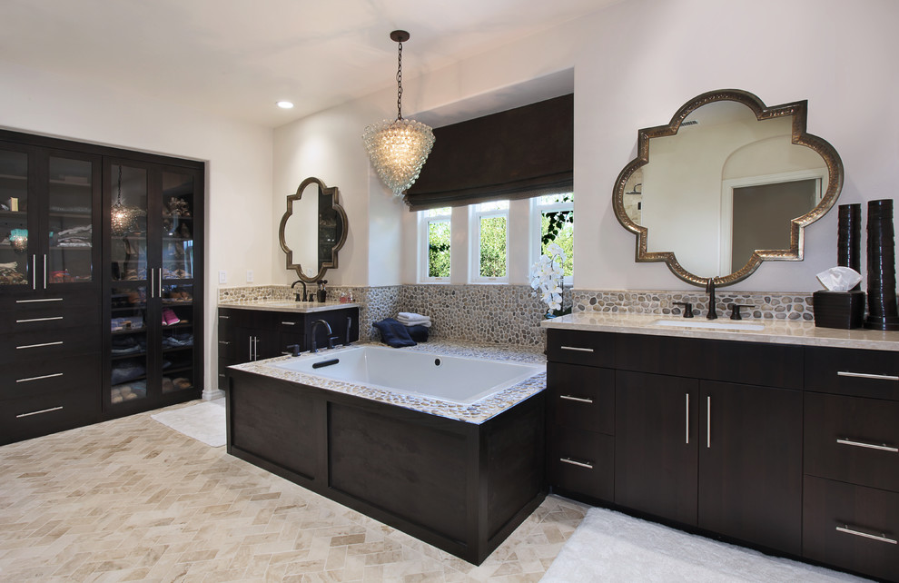Inspiration for a mid-sized contemporary master multicolored tile and pebble tile ceramic tile and beige floor bathroom remodel in Orange County with flat-panel cabinets, black cabinets, beige walls, an undermount sink, quartz countertops and a hinged shower door