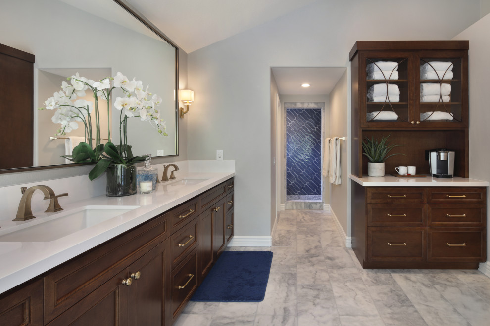Inspiration for a traditional ensuite wet room bathroom in Los Angeles with recessed-panel cabinets, dark wood cabinets, blue tiles, marble flooring, a submerged sink, grey floors, an open shower, white worktops, double sinks and a built in vanity unit.