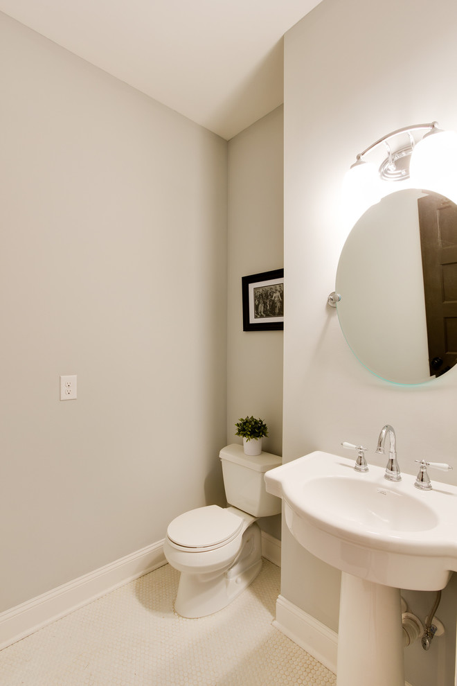 Small traditional family bathroom in Richmond with a pedestal sink, an alcove bath, a shower/bath combination, a two-piece toilet, white tiles, grey walls and ceramic flooring.