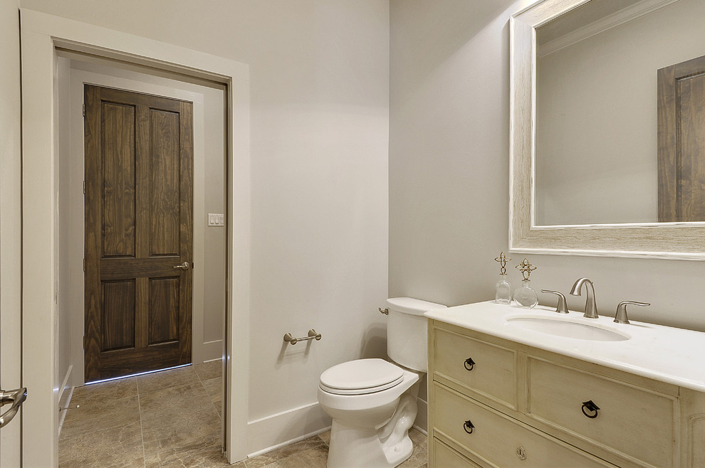 Стильный дизайн: ванная комната в классическом стиле с врезной раковиной, искусственно-состаренными фасадами, мраморной столешницей, бежевой плиткой, керамической плиткой, серыми стенами, полом из керамической плитки и душевой кабиной - последний тренд