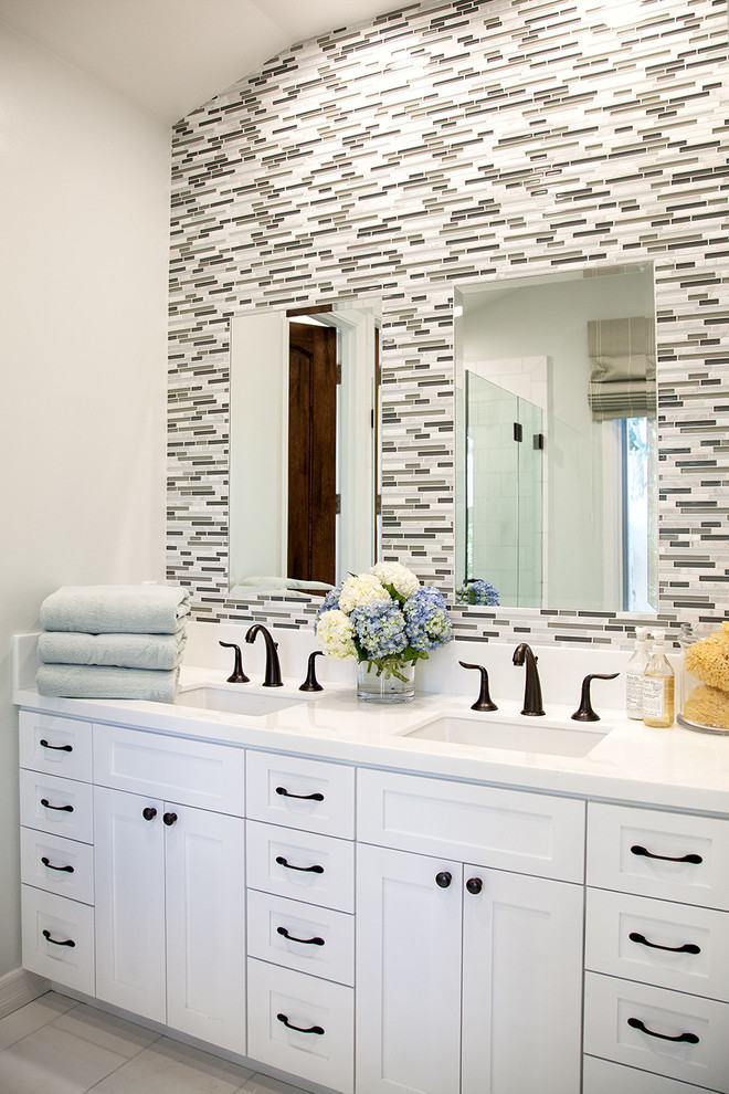 Inspiration for a transitional multicolored tile and matchstick tile bathroom remodel in Orange County