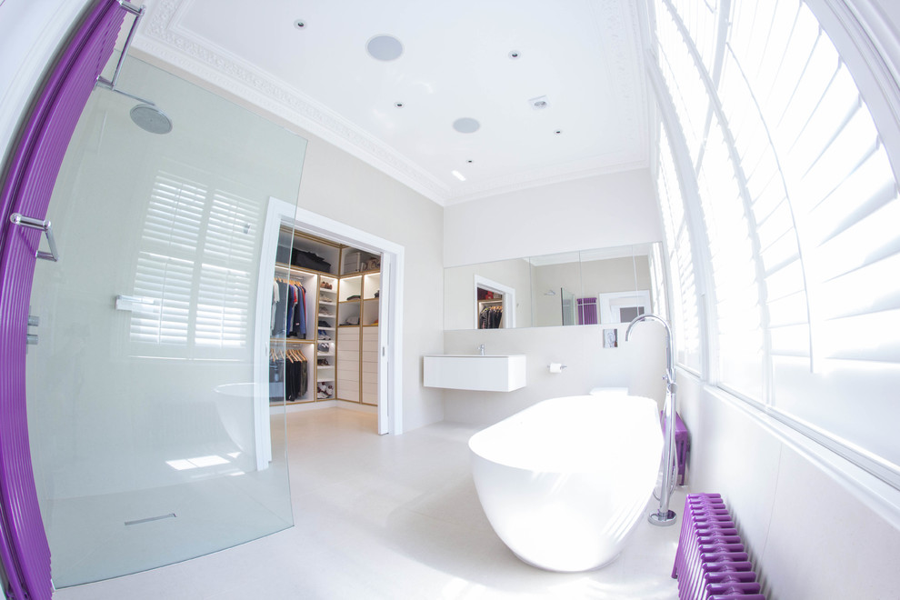 Design ideas for a medium sized modern ensuite bathroom in London with glass-front cabinets, white cabinets, a hot tub, a walk-in shower, a one-piece toilet, white tiles, cement tiles, white walls and terracotta flooring.