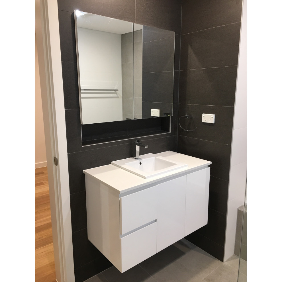 Design ideas for a small classic family bathroom in Sydney with flat-panel cabinets, white cabinets, a built-in bath, a corner shower, a two-piece toilet, white tiles, porcelain tiles, porcelain flooring, a built-in sink, engineered stone worktops, grey floors, an open shower, white worktops, a single sink, a floating vanity unit and a coffered ceiling.