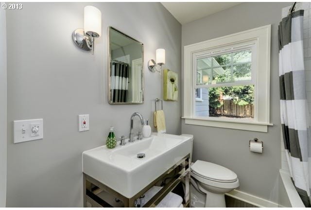 Example of a mid-sized trendy black tile and ceramic tile porcelain tile bathroom design in Portland with a pedestal sink, a two-piece toilet and gray walls