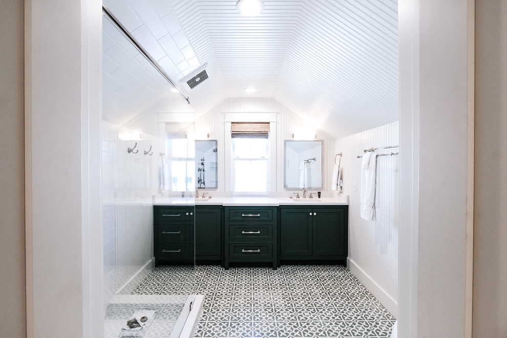 Photo of a small classic ensuite bathroom with beaded cabinets, green cabinets, a corner shower, a two-piece toilet, white tiles, ceramic tiles, white walls, cement flooring, a submerged sink, engineered stone worktops, green floors, an open shower and white worktops.