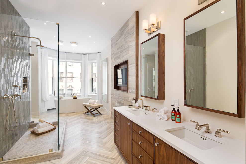 Example of a huge trendy master gray tile and stone tile travertine floor bathroom design in New York with a drop-in sink, shaker cabinets, medium tone wood cabinets, a one-piece toilet and white walls
