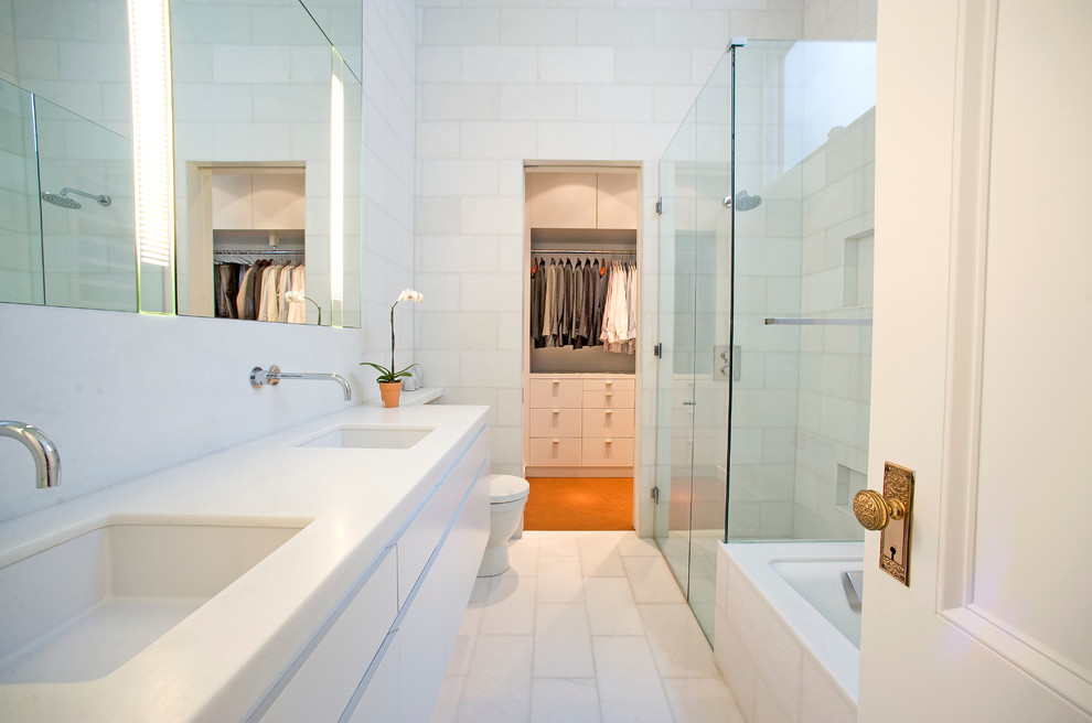 Trendy white floor bathroom photo in San Francisco with an undermount sink